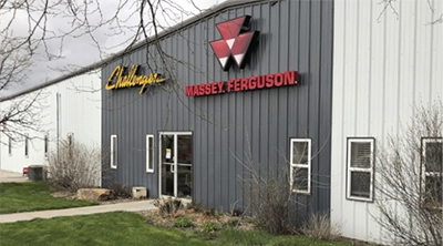 Front of Regier Equipment Company building with Challenger and Massey Ferguson signage